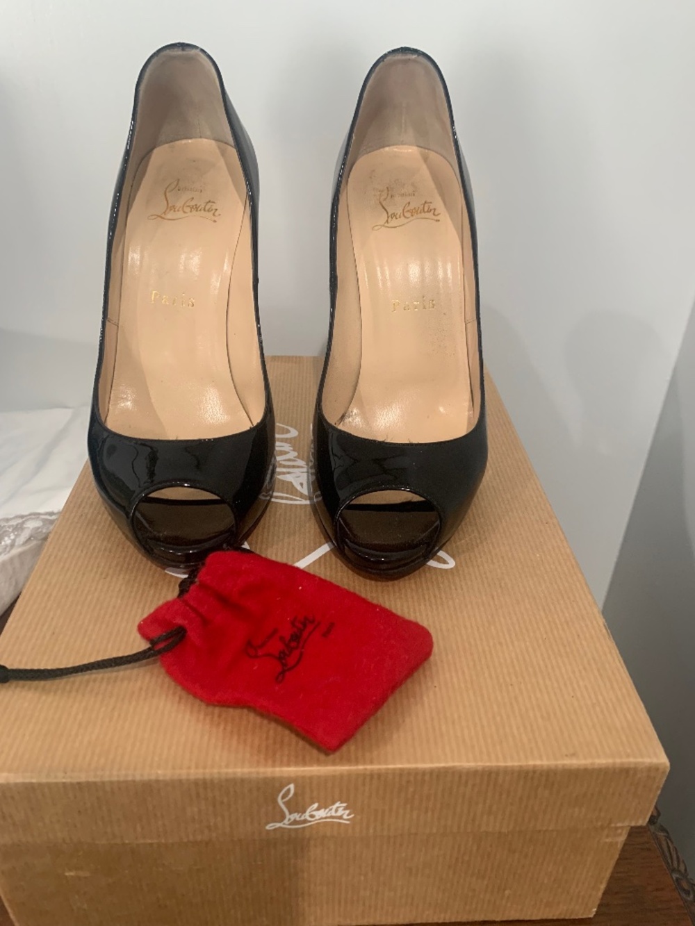 Christian Louboutin peep toe pumps